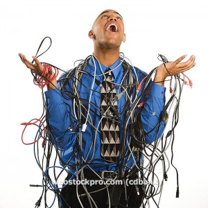 Man wrapped in cables.